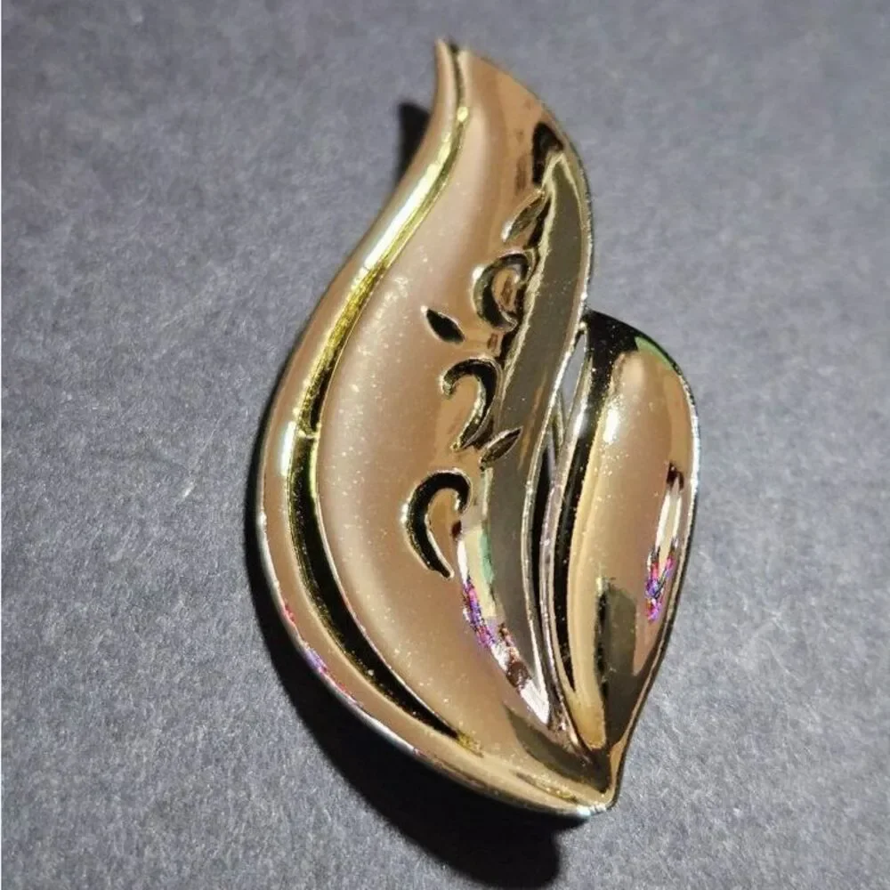 AJC vintage gold tone brooch